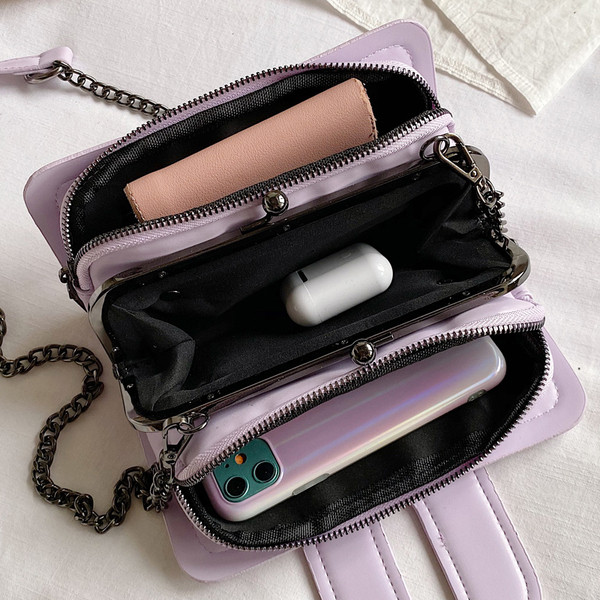 Geanta de dama moderna din piele ecologica cu ochiuri si catarama