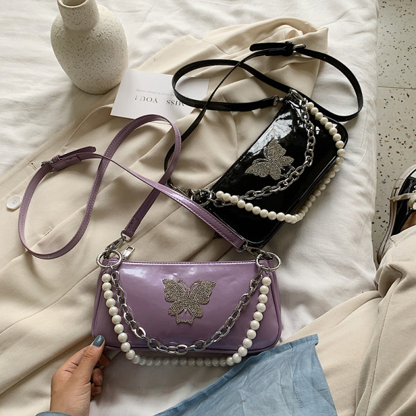 Naiste moodne dekoratiivpärlite ja metallelemendiga kott