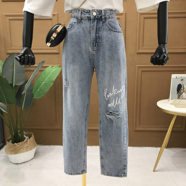 Blugi de damă actuali model drept cu motive rupte și inscripție