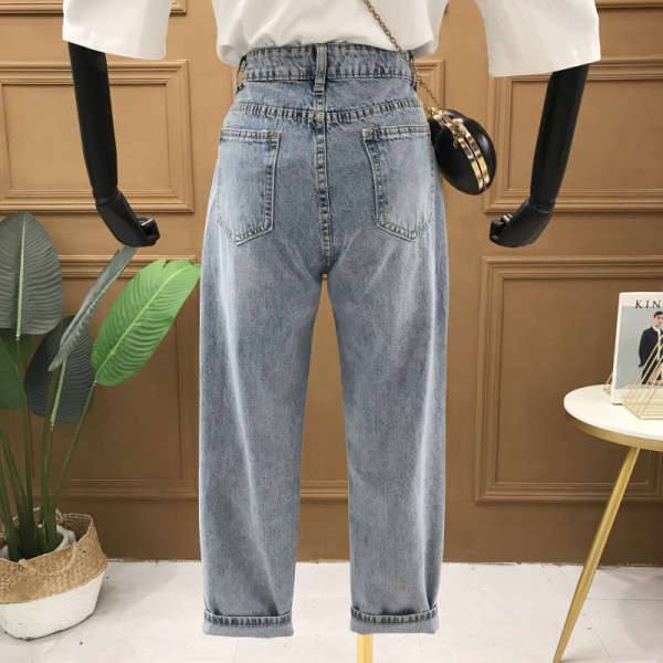 Blugi de damă actuali model drept cu motive rupte și inscripție