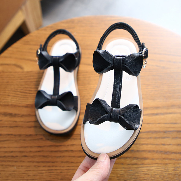 Moodsad paelte ja pandlaga laste sandaalid