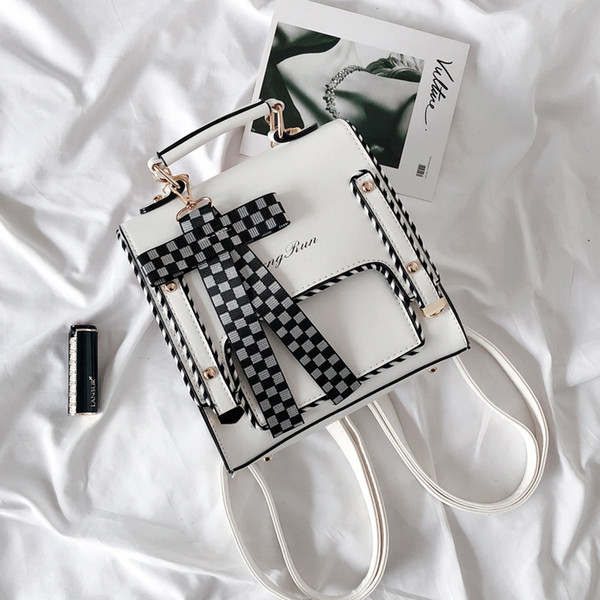 Sieviešu eko-ādas mugursoma ar lenti un uzrakstu