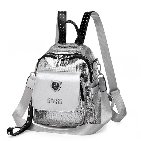 Moodne naiste seljakott kirja ja läikiva efektiga