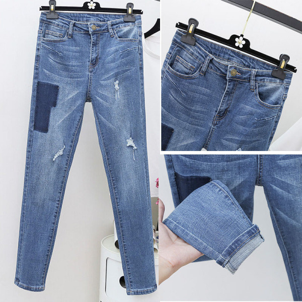 Moodne naiste teksapükstega mudel kõrge vöökohaga ja suurustega kuni 5XL