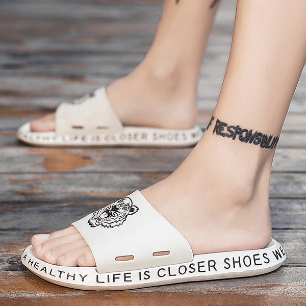 Aplikatsiooni ja pealdistega libisemiskindlad meeste sussid