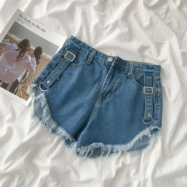 Naiste lühikesed luku ja kõrge vöökohaga teksad