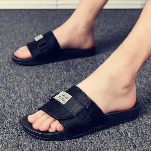 Kleebiste ja pealdisega meeste vabaaja sussid