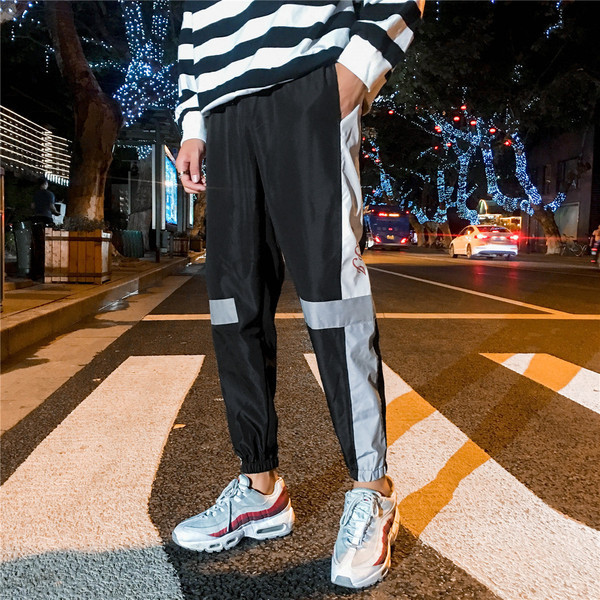 Sportsko-casual muške hlače s elastičnim strukom i reflektirajućim elementima
