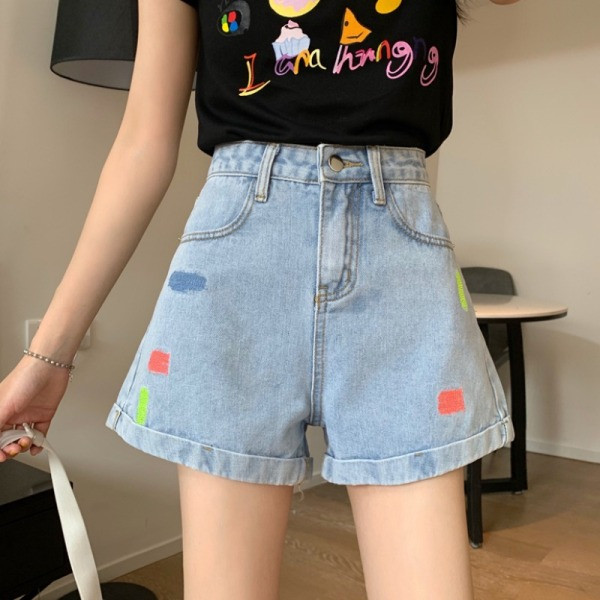 Uus kõrge vöökoha ja tikandiga naiste lühikeste teksapükste mudel