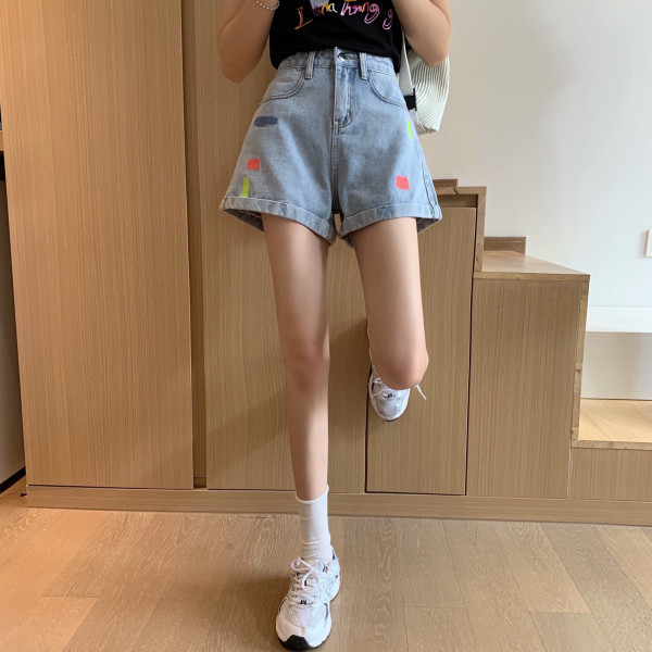 Uus kõrge vöökoha ja tikandiga naiste lühikeste teksapükste mudel