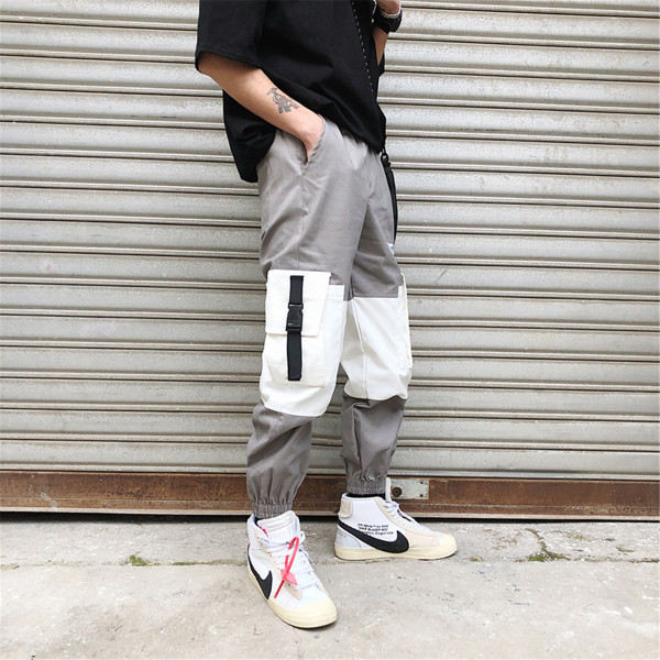 Pantaloni largi de bărbați cu buzunare și inscripție