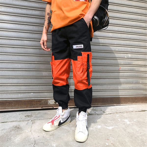 Pantaloni largi de bărbați cu buzunare și inscripție