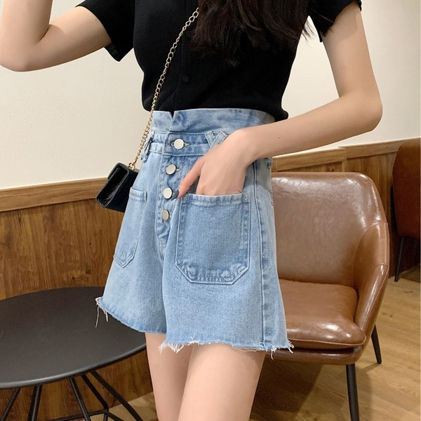 Naiste lühikesed nööpidega ja kõrge vöökohaga teksad