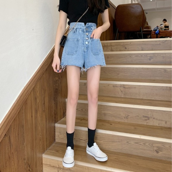 Naiste lühikesed nööpidega ja kõrge vöökohaga teksad