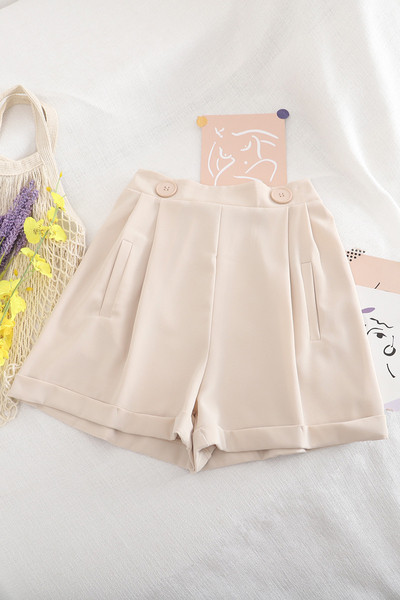 Női széles nadrág gombokkal és A-vonallal