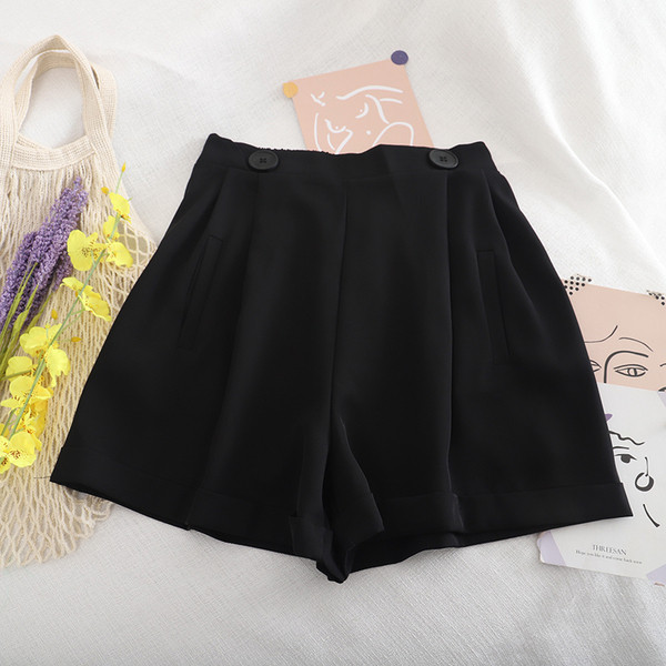 Női széles nadrág gombokkal és A-vonallal