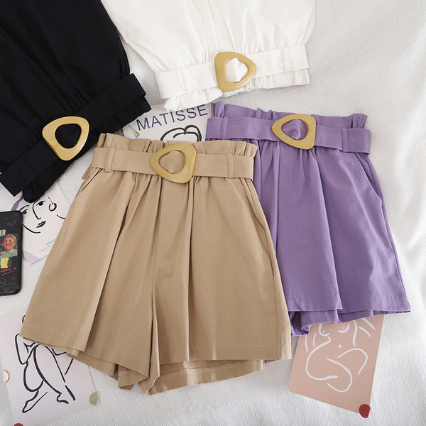 Naiste laiad vöö ja kõrge vöökohaga püksid