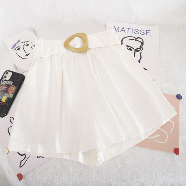 Naiste laiad vöö ja kõrge vöökohaga püksid