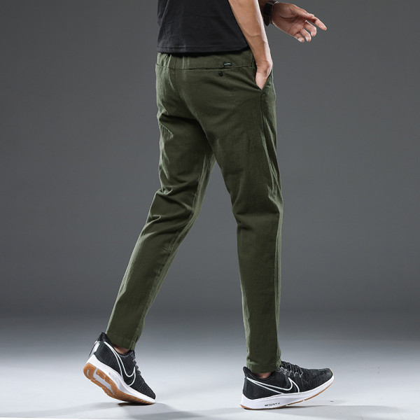 Sihuke meeste pükste sirge mudel taskutega