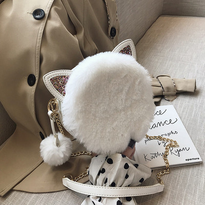 Modern női válltáska pehellyel