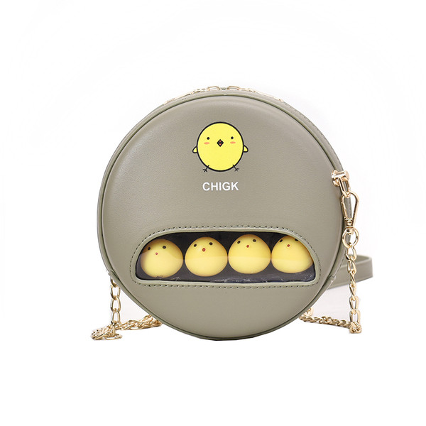 Igapäevane ümara kuju ja aplikatsiooniga naistekott