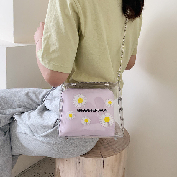 Caurspīdīga sieviešu soma ar aplikāciju