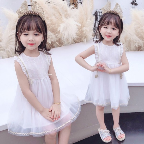 Moodne tülli ja lipsudega lastekleit