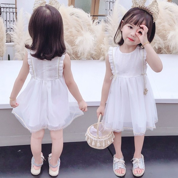 Moodne tülli ja lipsudega lastekleit