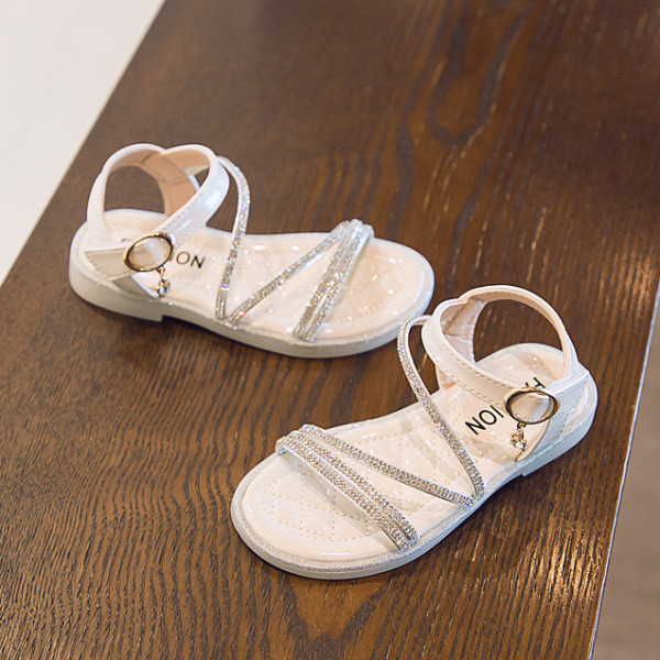 Mūsdienīgas bērnu sandales meitenēm ar plānām lencītēm un akmeņiem