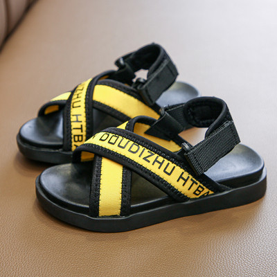 Ikdienas bērnu sandales ar krusta siksnām un uzrakstiem