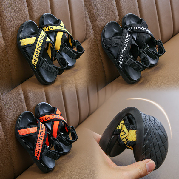 Ikdienas bērnu sandales ar krusta siksnām un uzrakstiem