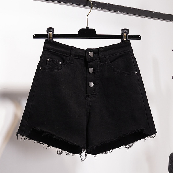 Mūsdienīgi īsi džinsi ar izgriezumiem un pogām