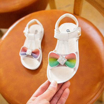 Bērnu sandales meitenēm ar plakanām zolēm un krāsainu lentīti