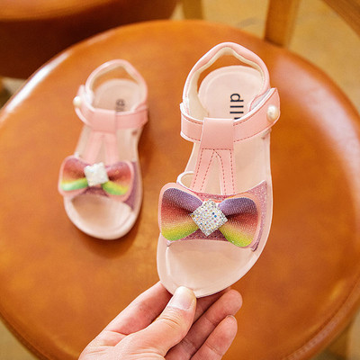 Bērnu sandales meitenēm ar plakanām zolēm un krāsainu lentīti