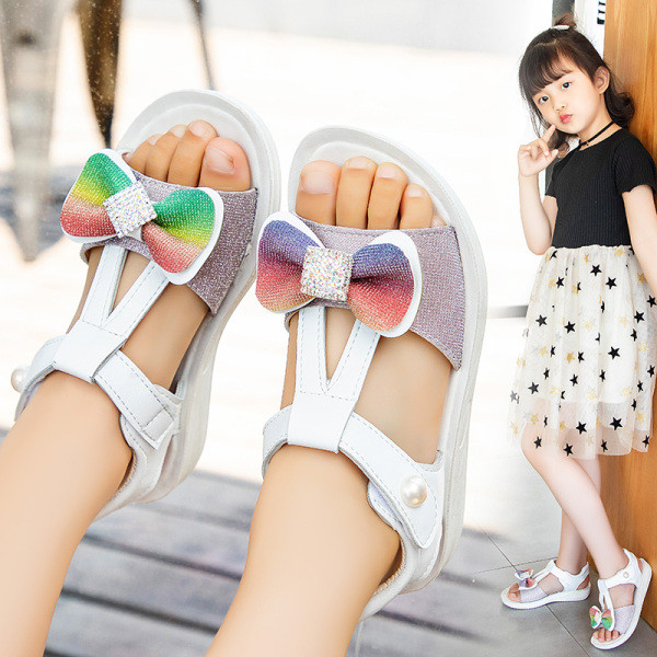 Bērnu sandales meitenēm ar plakanām zolēm un krāsainu lentīti