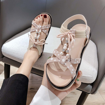 Ikdienas sieviešu sandales ar plakanām zolēm un krāsainām lencēm