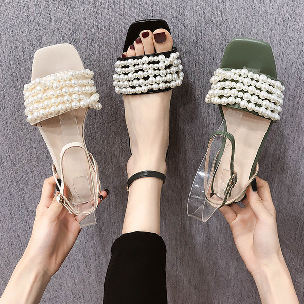 Modernas sieviešu sandales ar zemu papēdi un pērļu elementu