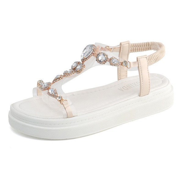 Modernas sieviešu sandales ar augstām zolēm un krāsainiem akmeņiem