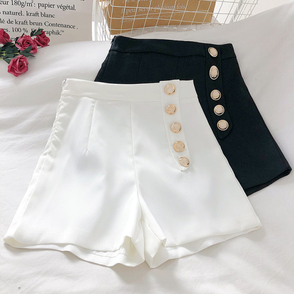 Moodsad naiste püksid nööpidega laiune mudel