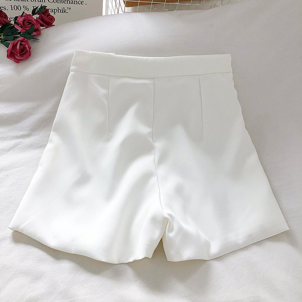 Moodsad naiste püksid nööpidega laiune mudel