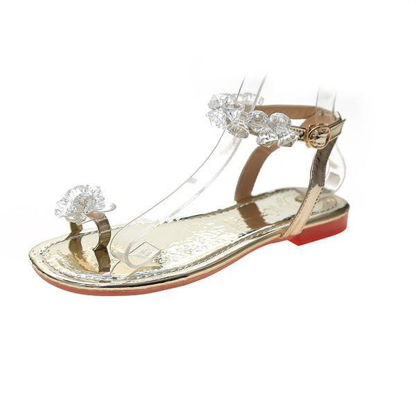 Modernas sieviešu sandales ar zemām zolēm un elementiem-akmeņiem