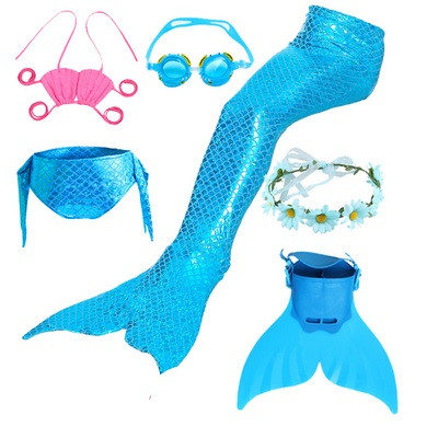 Children`s swimsuit including fins, goggles, tiara and mermaid tail