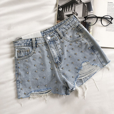 Mūsdienīgi īsi džinsi ar cilpām un augstu vidukli