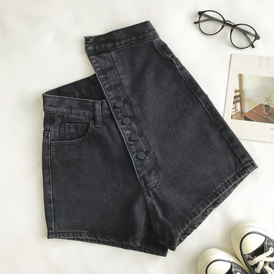 Naiste lühikesed kõrge vöökoha ja nööpidega teksad