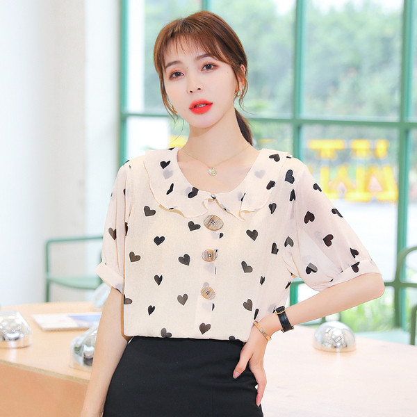 Bēšs sieviešu krekls ar sirsniņu apdruku