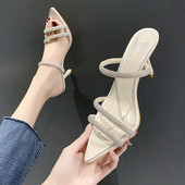 Moderns sieviešu sandaļu smails modelis ar plānu papēdi un akmeņiem