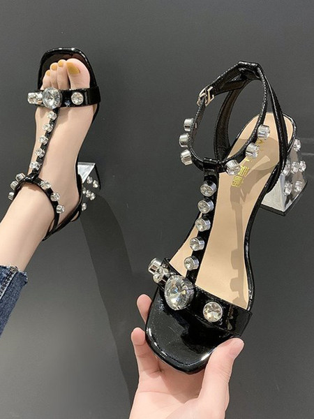 Modernas sieviešu sandales ar akmeņiem un biezu papēdi