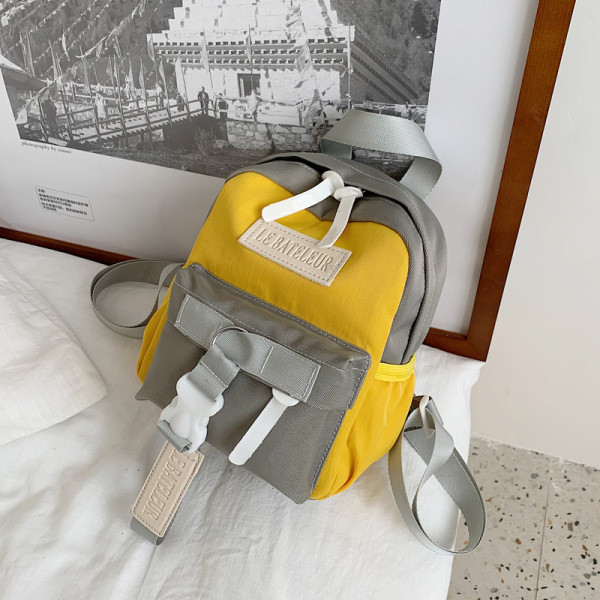 Naiste igapäevane küljetaskutega seljakott