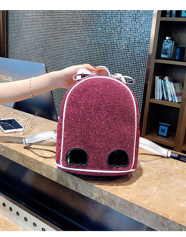 Naiste ajakohane läikiva elemendiga seljakott