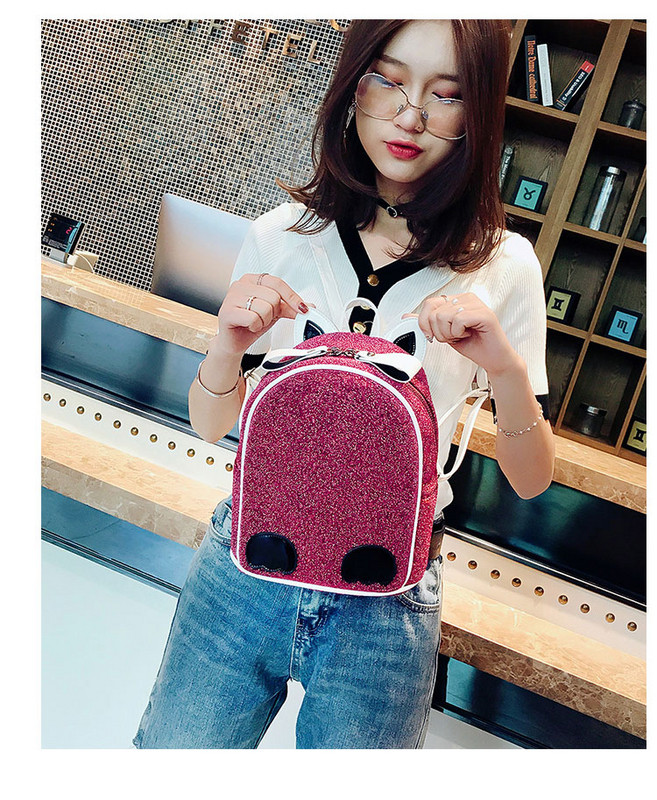 Naiste ajakohane läikiva elemendiga seljakott